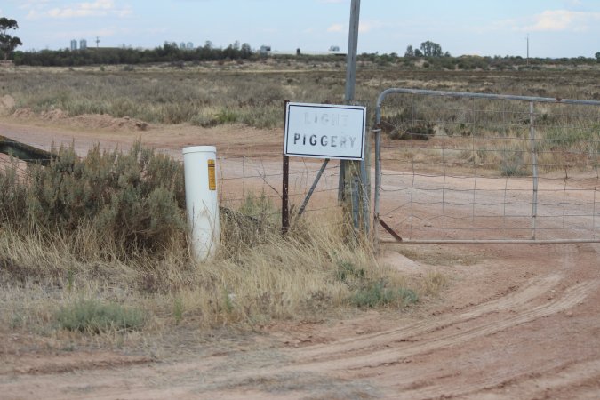 Sign at entrance identifying Light Piggery