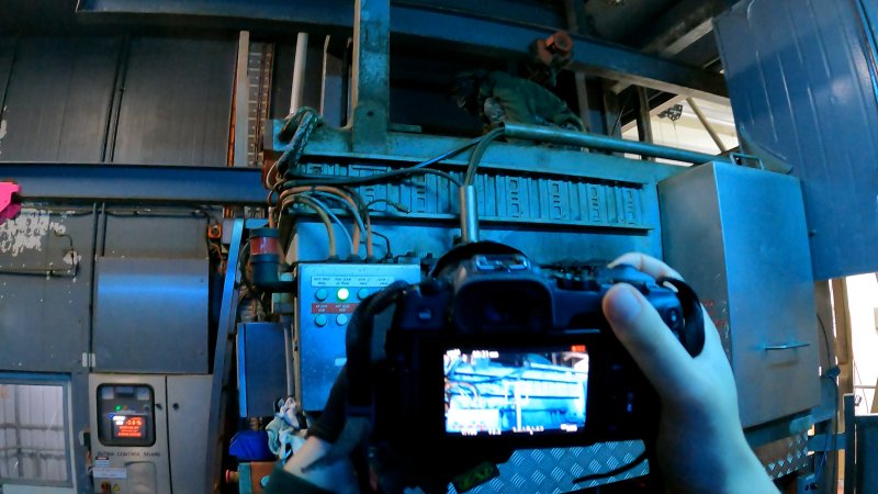 Investigator filming inside the gas chamber room at Corowa Slaughterhouse