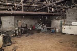 Empty slaughter room - After closure of farm. Scalding tank visible at back. - Captured at Wally's Piggery, Jeir NSW Australia.
