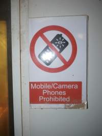 Mobile / camera phones prohibited sign - Australian pig farming - Captured at Grong Grong Piggery, Grong Grong NSW Australia.