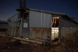Farrowing shed outside at night - Australian pig farming - Captured at Ludale Piggery, Reeves Plains SA Australia.